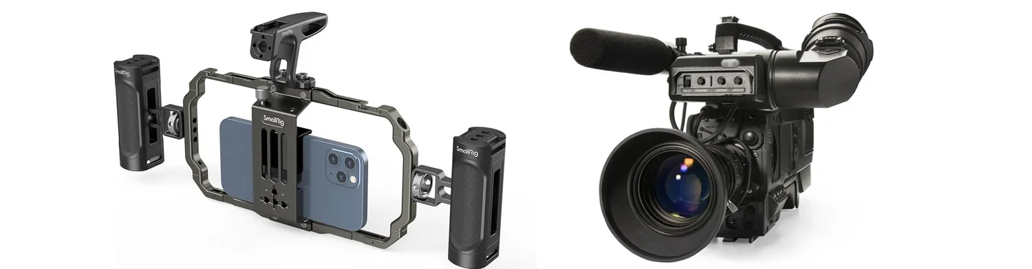 A smartphone in a handled cage beside a broadcast video camera with a large lens and a shotgun mic.