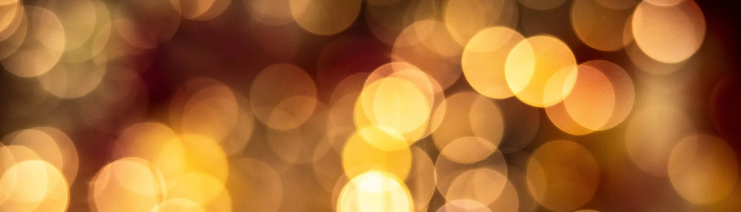 Warm golden bokeh lights glowing out of focus.